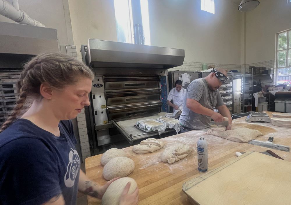 bakers working on dough